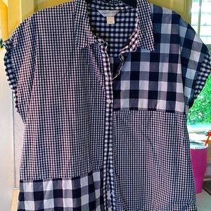 Nice black and white shirt. Large